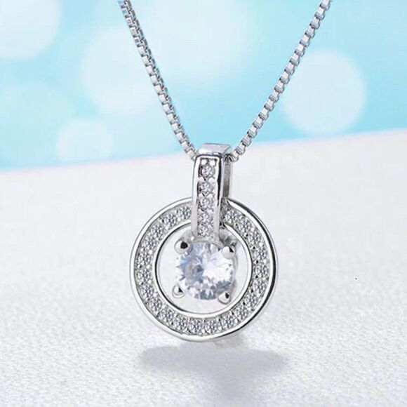 Sterling Silver Solitaire and Halo Pendant Necklace - Picture 2 of 7